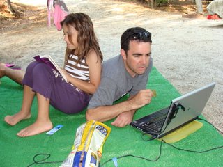 Working on the turf outside the mobile home office